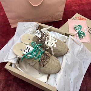 Miu Miu Tan Slip-Ons with Green and White Laces